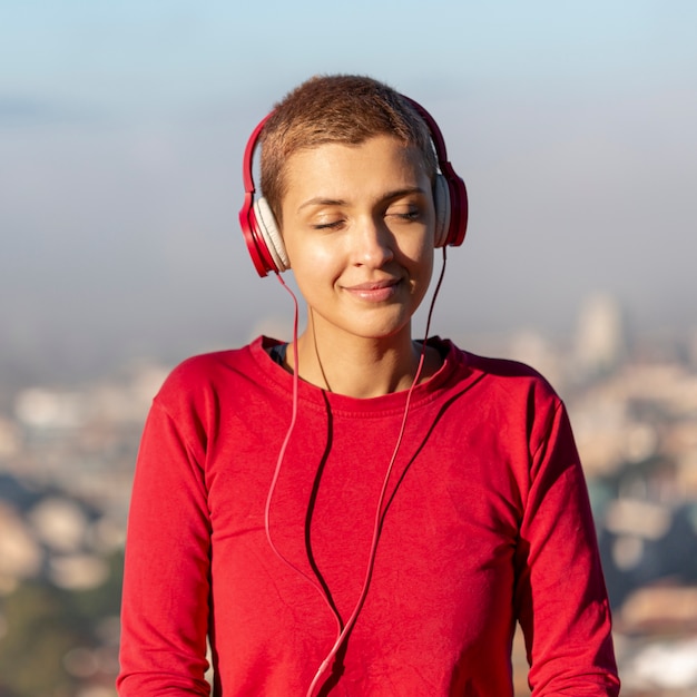 Free Photo lovely woman enjoying music