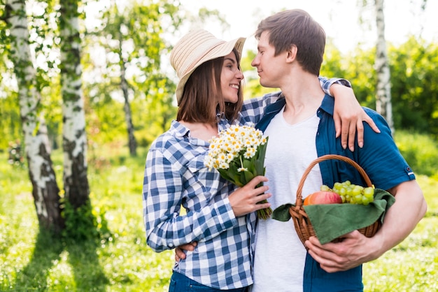 Free photo lovers enjoying each other in park