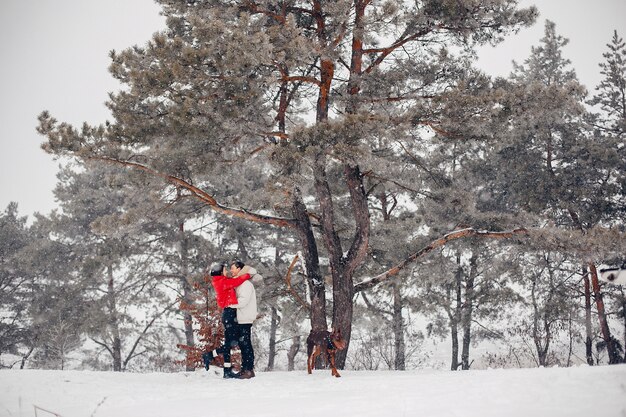 Loving couple walking in a winter park