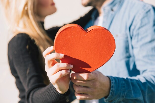 Loving couple with decorative heart