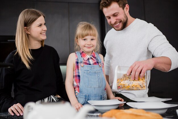 Loving family cooking breakfast