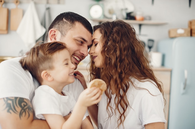 Loving family sitting in a kitchen at home