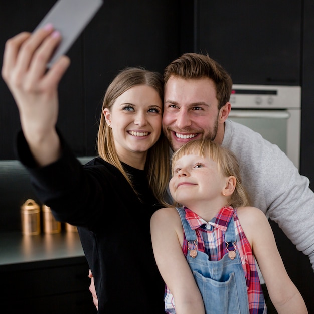 Free photo loving family taking selfie