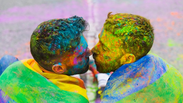 Free photo loving gay couple gathered kissing