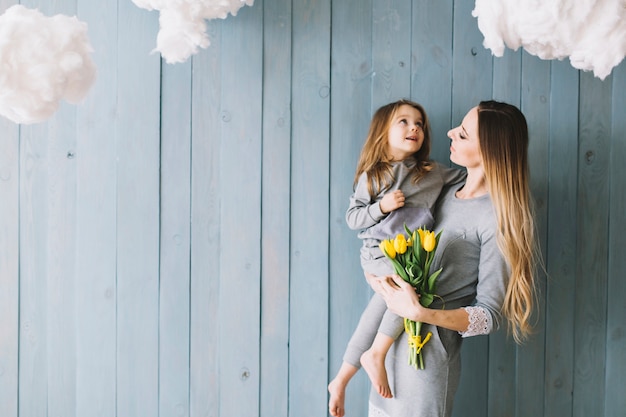 Free Photo loving mother and daughter celebrating mothers day