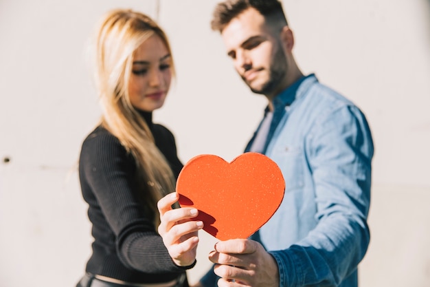 Free Photo loving people showing decorative heart