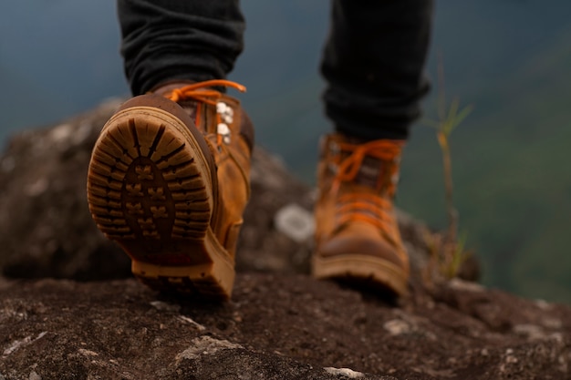 Low angle adventurous man bivouacking