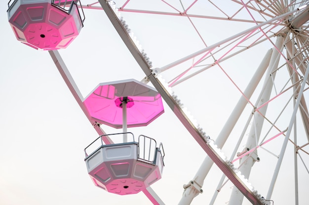 Free Photo low angle of amusement park wheel