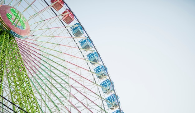 Low angle colouful ferris wheel 