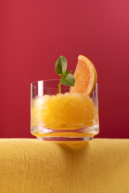 Free Photo low angle delicious granita dessert with grapefruit