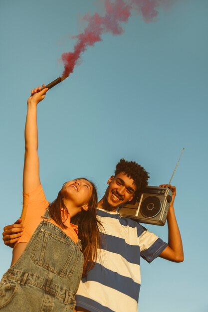 Low angle friends with cassette player