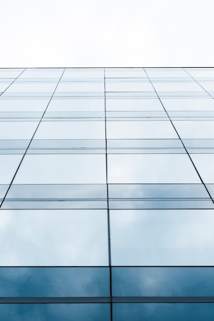 Free Photo low angle high slope glass building