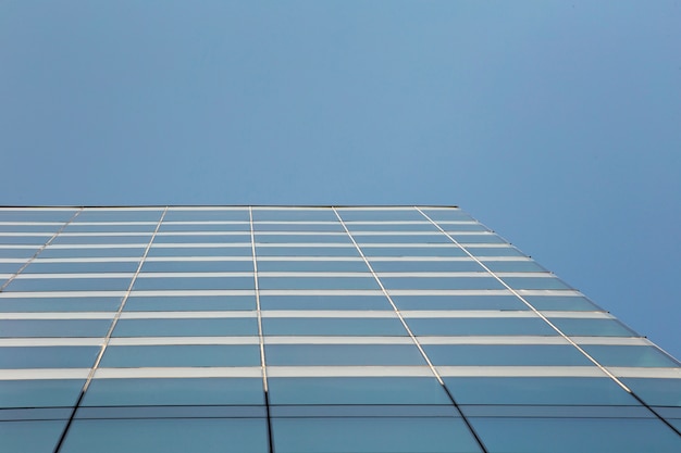 Free photo low angle modern glass building