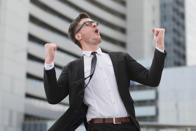 Low angle modern man happy