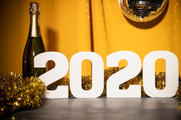 Free Photo low angle new year 2020 sign on table