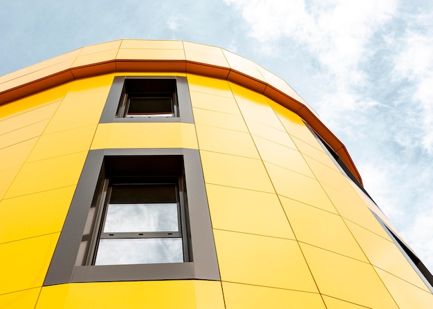 Low angle of a round building corner in the city