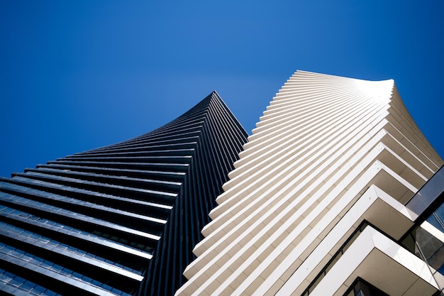 Low angle shot of Axis Towers in Tbilisi Georgia under a blue sky