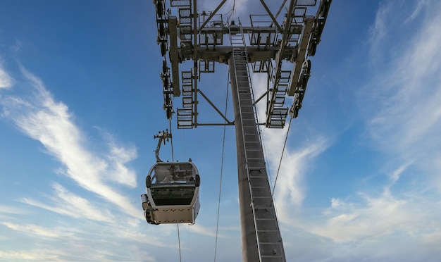 Free Photo low angle shot of cableway and cloudy sky