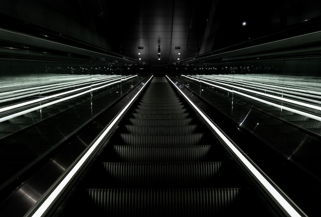 Free Photo low angle shot of an escalator going up in a metro station in vijzelgracht, netherlands