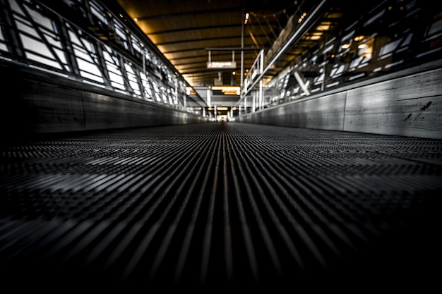 Low angle shot of an escalator with dirtproof grating