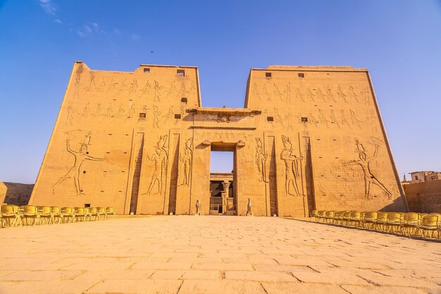 Low angle shot of the main entrance of The Temple of Horus at Edfu, Egypt