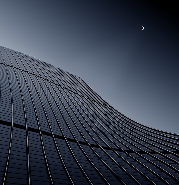 Low angle shot of a modern business building touching the clear sky