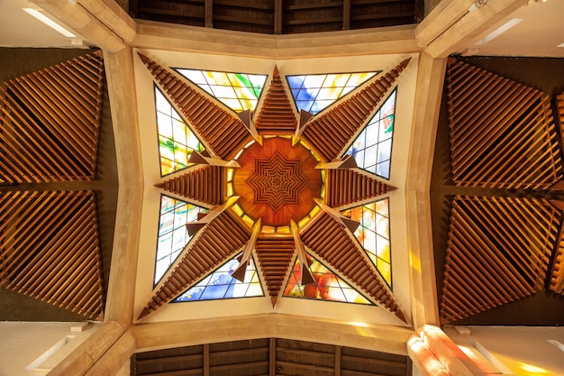 Low angle shot of a modern stained glass window in Sheffield cathedral