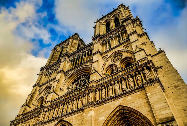 Low angle shot of the Square Jean XXIII captured under the beautiful cloudy sky in Paris, France