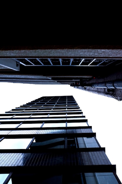 Low angle shot of two large skyscrapers in the city