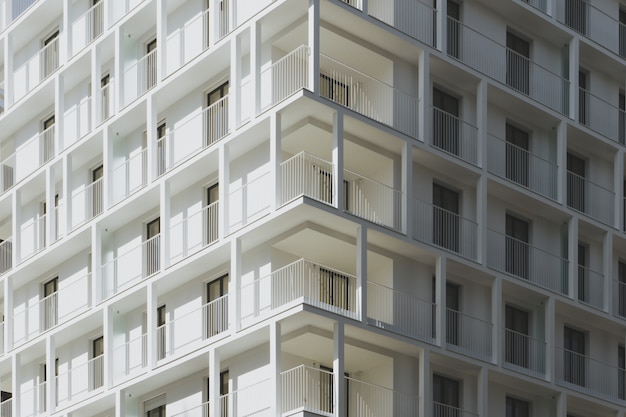 Low angle shot of a white concrete building captured at day time