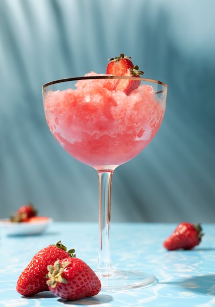 Free photo low angle tasty granita dessert with strawberries