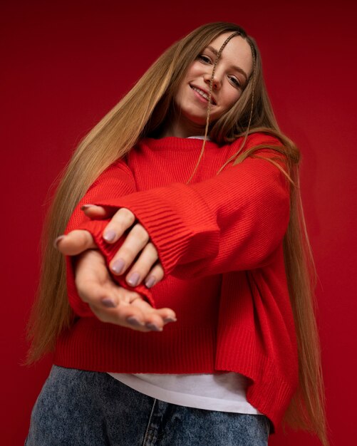 Low angle of a teenage girl dancing and smiling