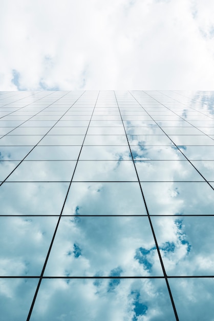 Low angle view of tall glass building