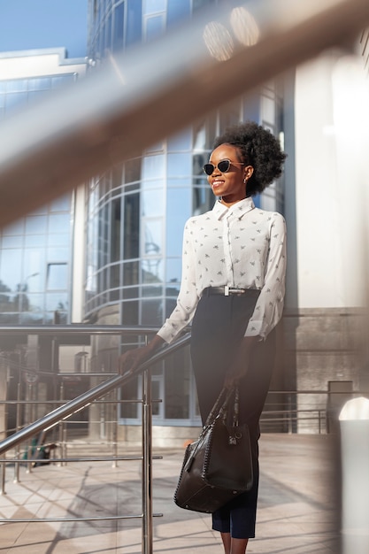 Low angle woman on balcony