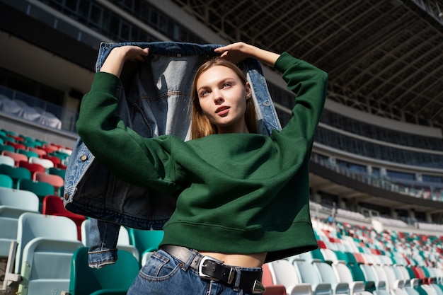 Free Photo low angle woman posing outdoors