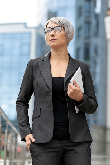 Low angle woman in suit outdoor