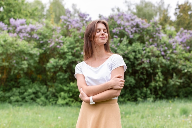 Low angle woman with arms crossed