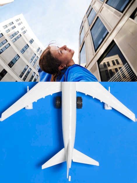 Free photo low angle woman with plane collage