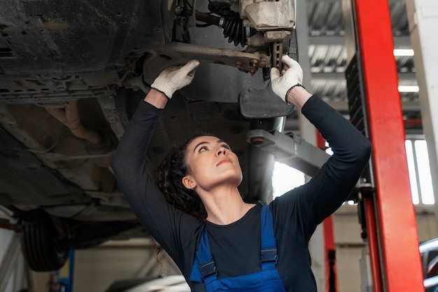 Free photo low angle woman working in service