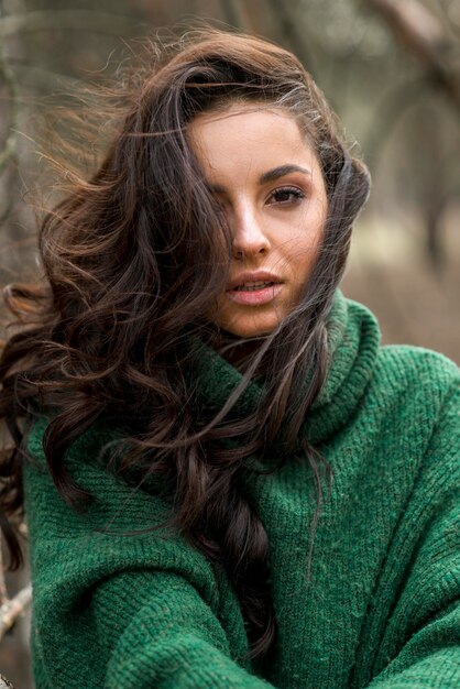 Low angle young woman in nature