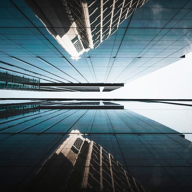 Free photo low view modern skyscrapers office buildings