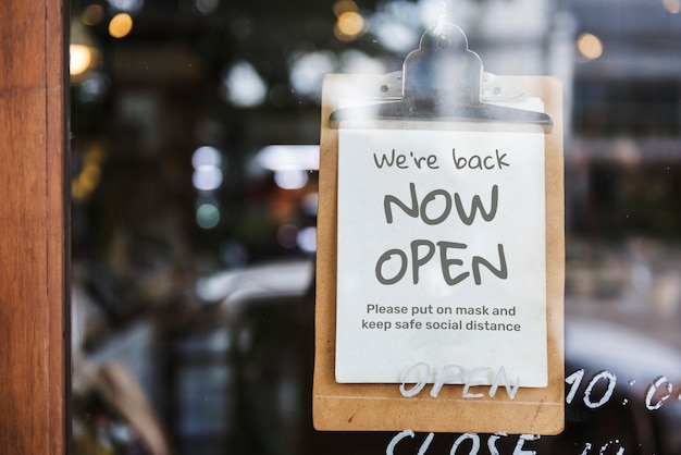 &lsquo;We&rsquo;re back, now open&rsquo; cafe sign after covid-19 pandemic