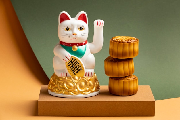 Lucky cat with golden details on podium