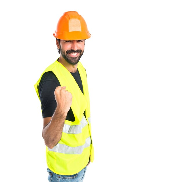 Lucky workman over isolated white background