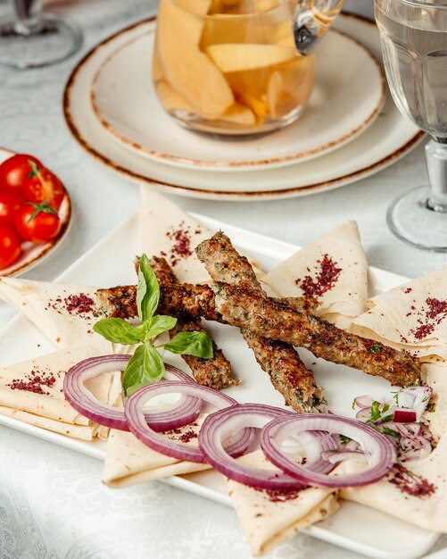 Lule kebab with herbs inside