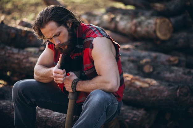 Lumberjack in forest