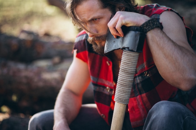 Free Photo lumberjack in forest