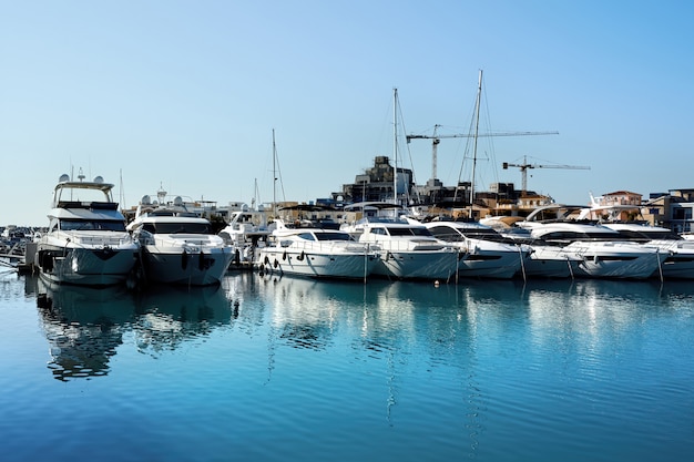 Free photo luxurious yachts in a port in the evening