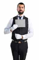 Free photo luxury waiter holding an empty placard