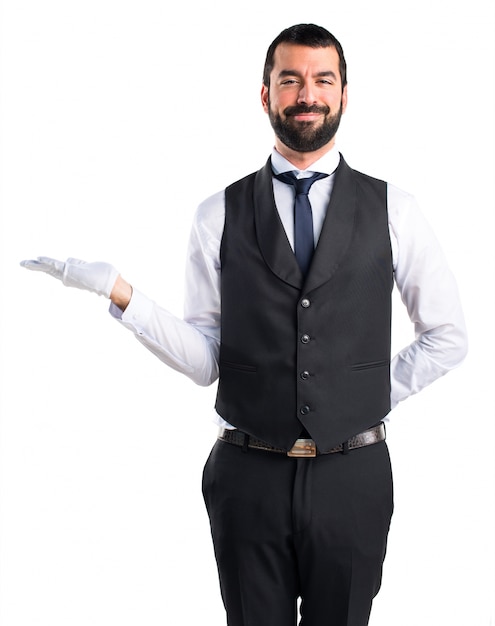 Free photo luxury waiter holding something